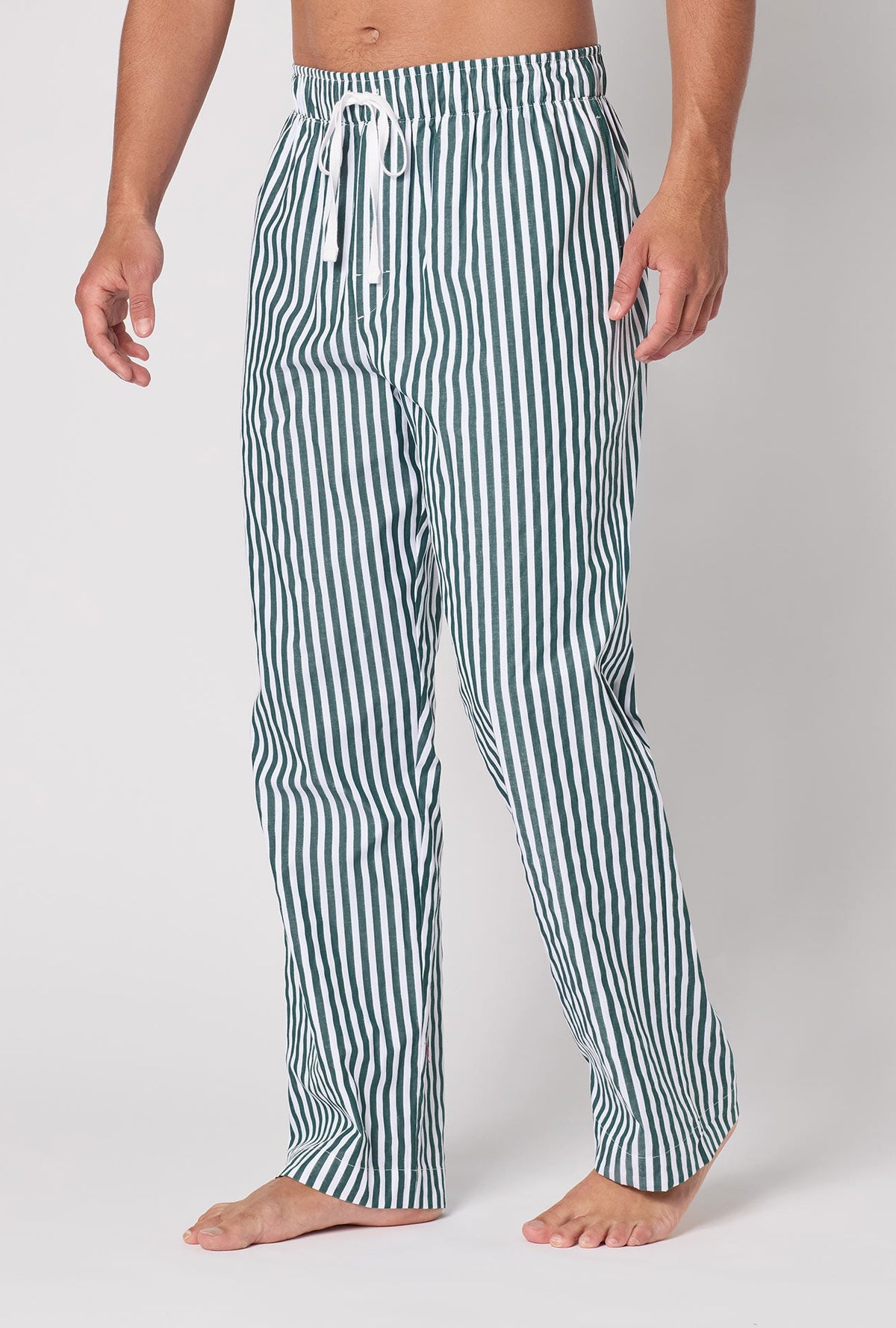 A lady wearing Green Signature Stripe Men's Woven Cotton Sateen Pj Pant walking
