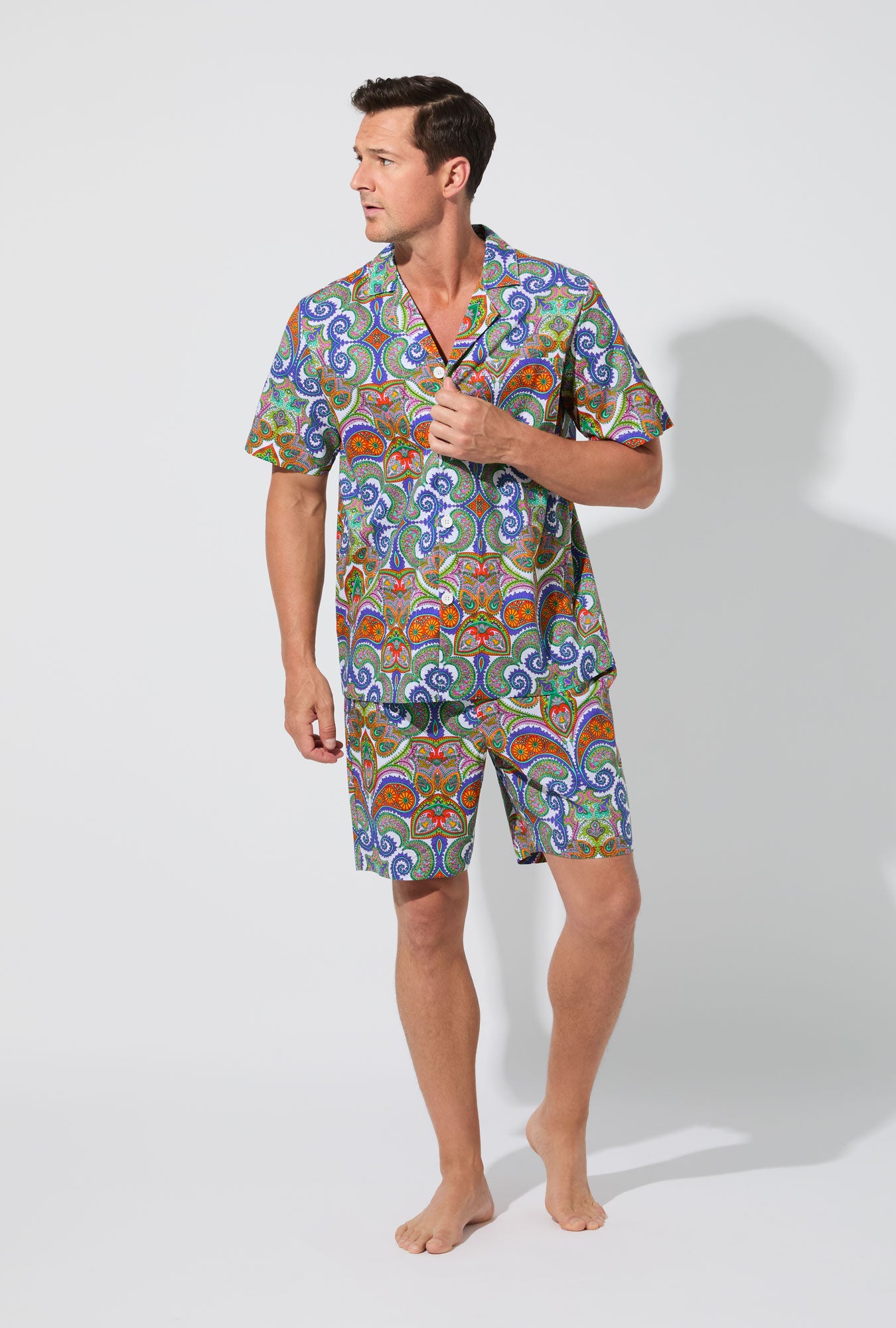 A man wearing BedHead X Mr. Turk Paisley Men's Short Sleeve Woven Cotton Poplin Short PJ Set