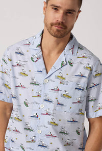 A man wearing Catch A Wave, Snoopy Men's Short Sleeve Woven Cotton Poplin Short Pj Set closer look