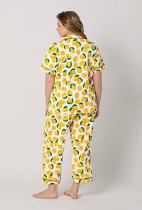 A lady wearing plus size White and  Yellow Short Sleeve Classic Stretch Jersey Cropped Pj Set back view