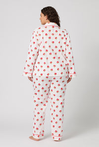 A Lady Wearing Plus Size Celeste Long Sleeve Classic Woven Supersoft Cotton Poplin Pj Set posing with a back view look