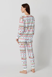 A lady wearing Peanuts® Winter Parade Long Sleeve Pullover Crew And Jogger Stretch Jersey Pj Set back view