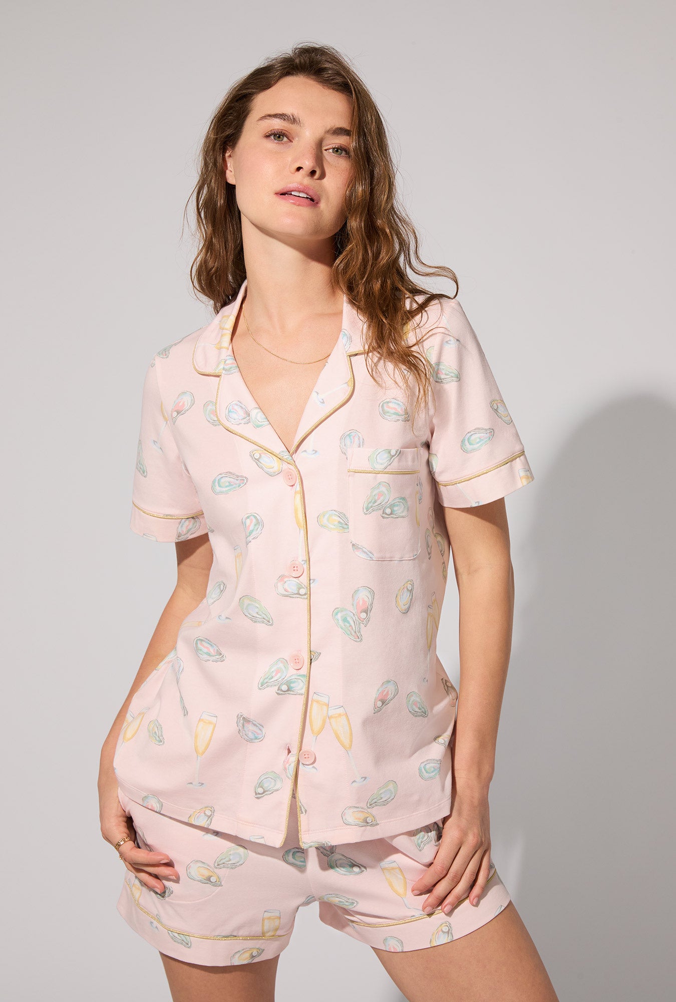 A lady wearing Oyster and Champagne Short Sleeve Classic Shorty Stretch Jersey PJ Set