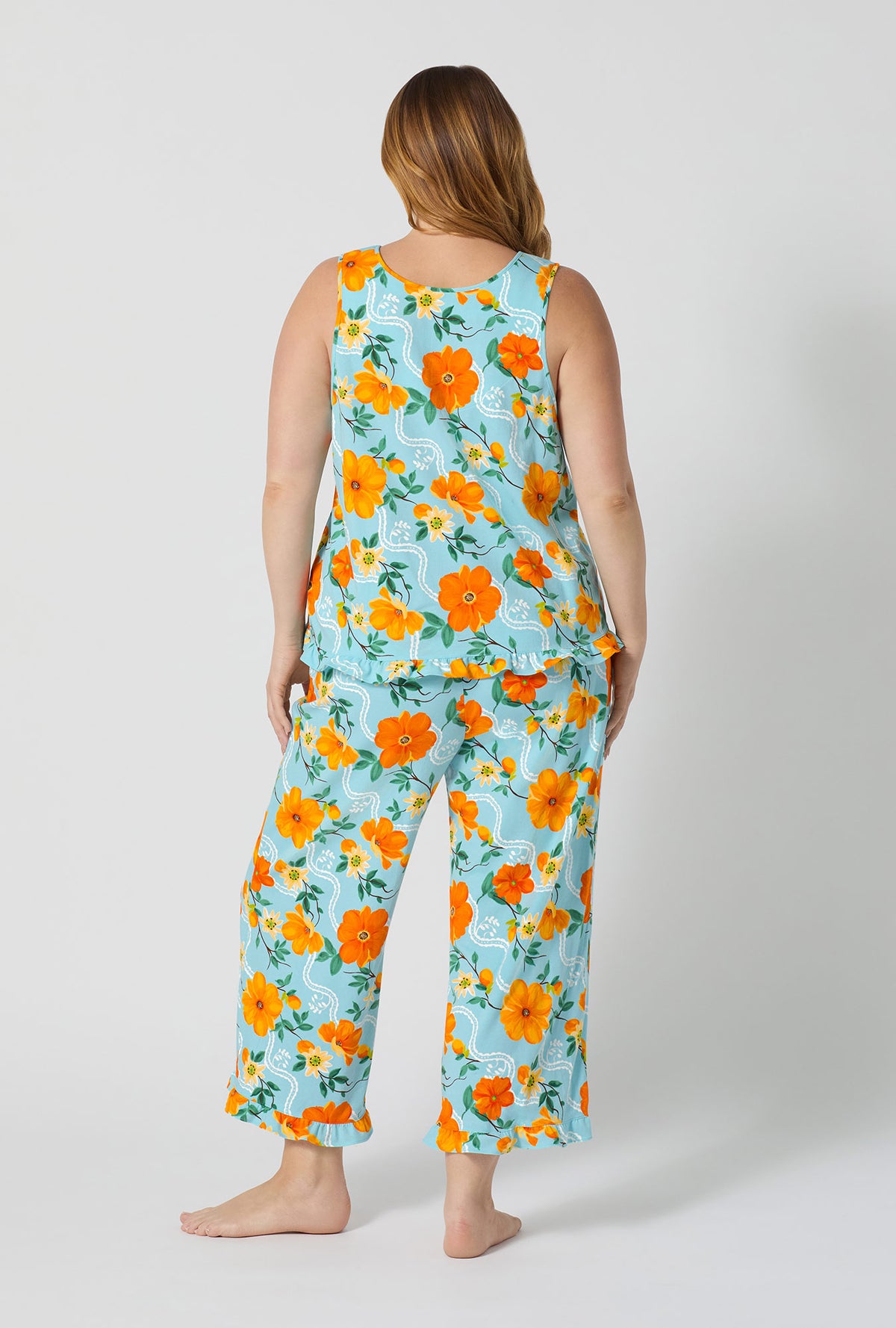A lady wearing plus size Golden Breeze Ruffle Tank Stretch Jersey Cropped Pj Set back view