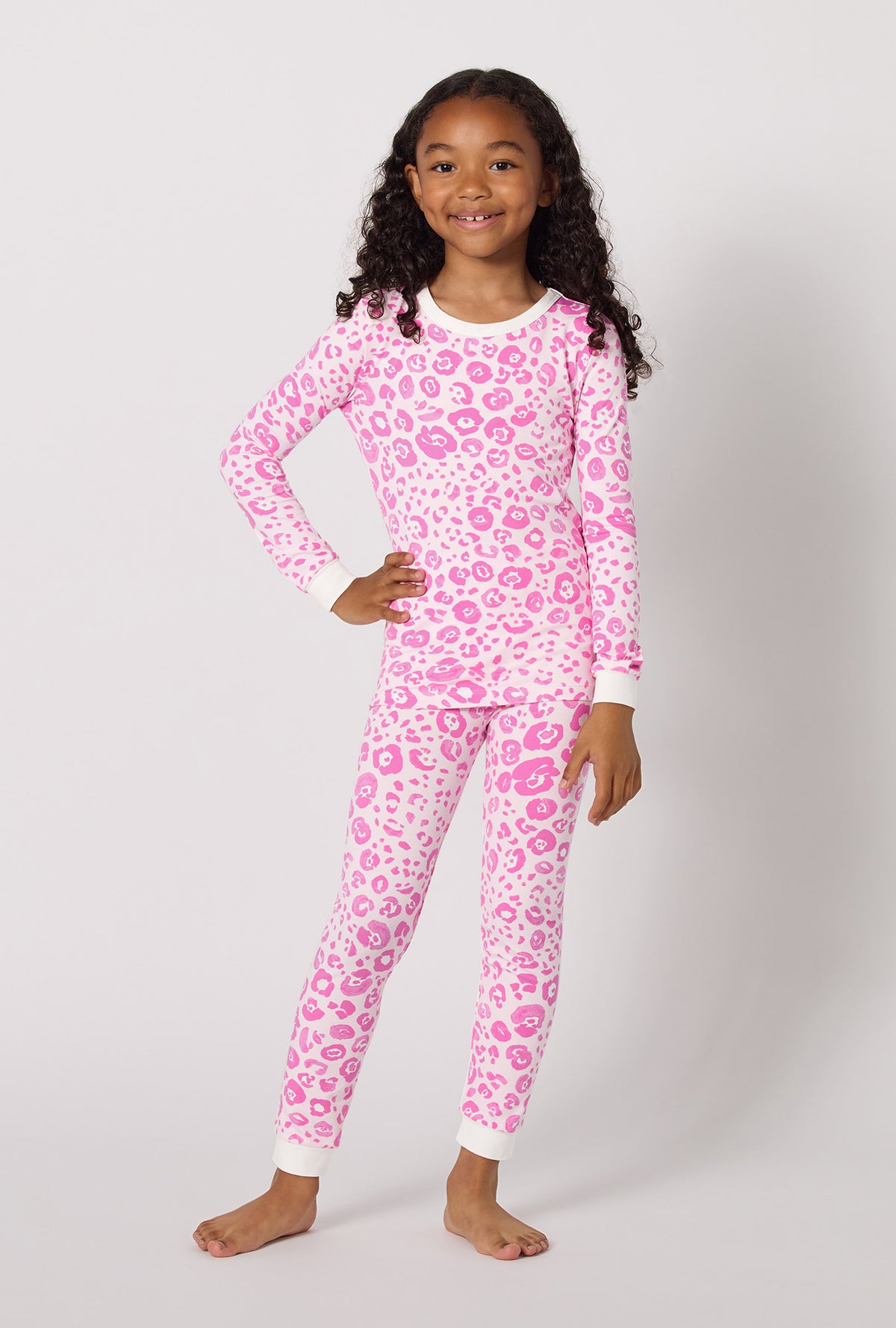 A Girl Wearing Valentina Leopard Long Sleeve Stretch Jersey Kids Pj Set