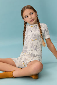 A girl wearing City That Never Sleeps Short Sleeve Stretch Jersey Kids Short PJ Set