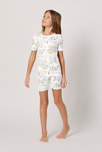 A girl wearing City That Never Sleeps Short Sleeve Stretch Jersey Kids Short PJ Set