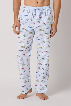 A man wearing Catch A Wave, Snoopy Men's Woven Cotton Poplin Pj Pant