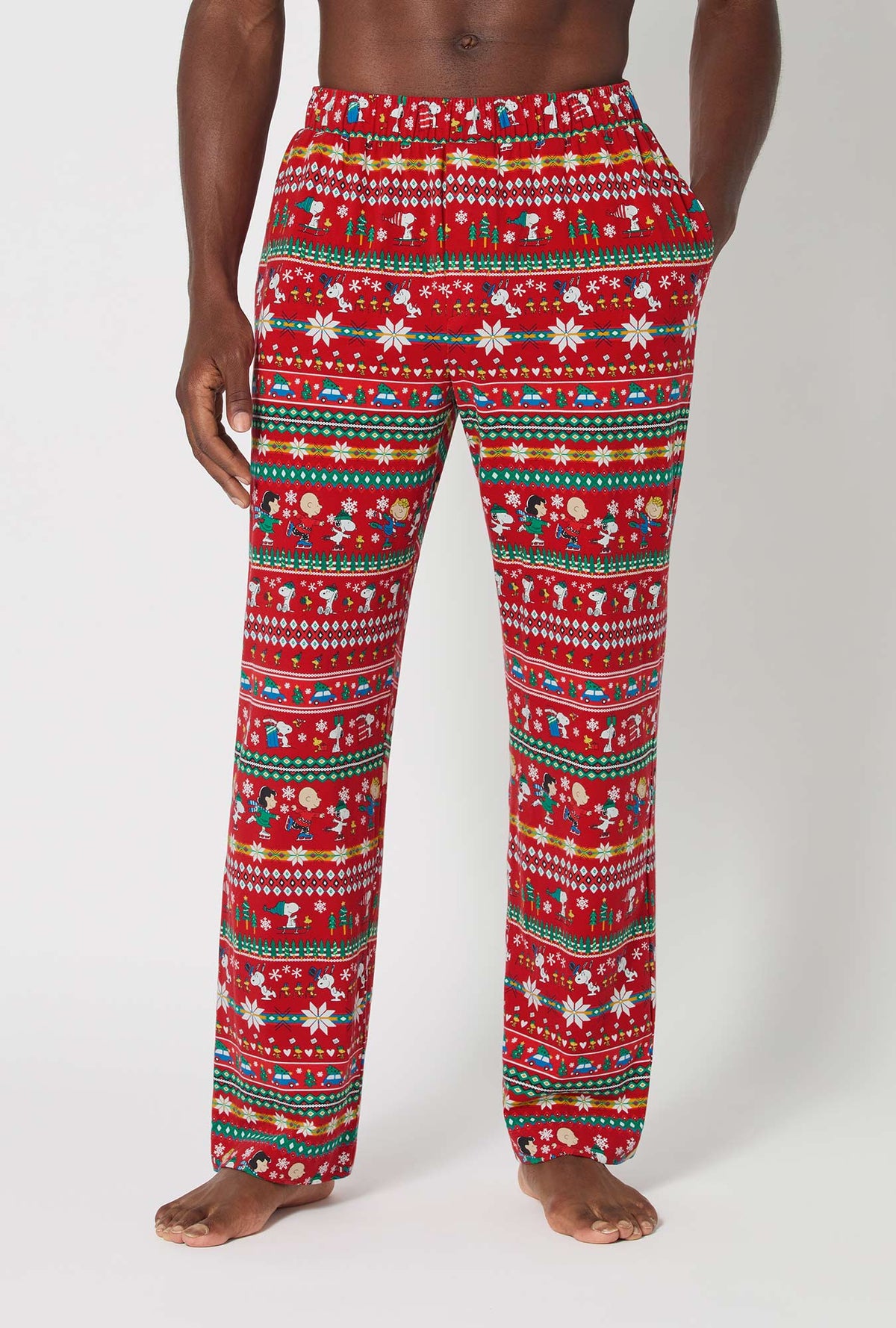 A man wearing Peanuts®  Winter Fairisle Men&#39;s Stretch Jersey Pj Pant