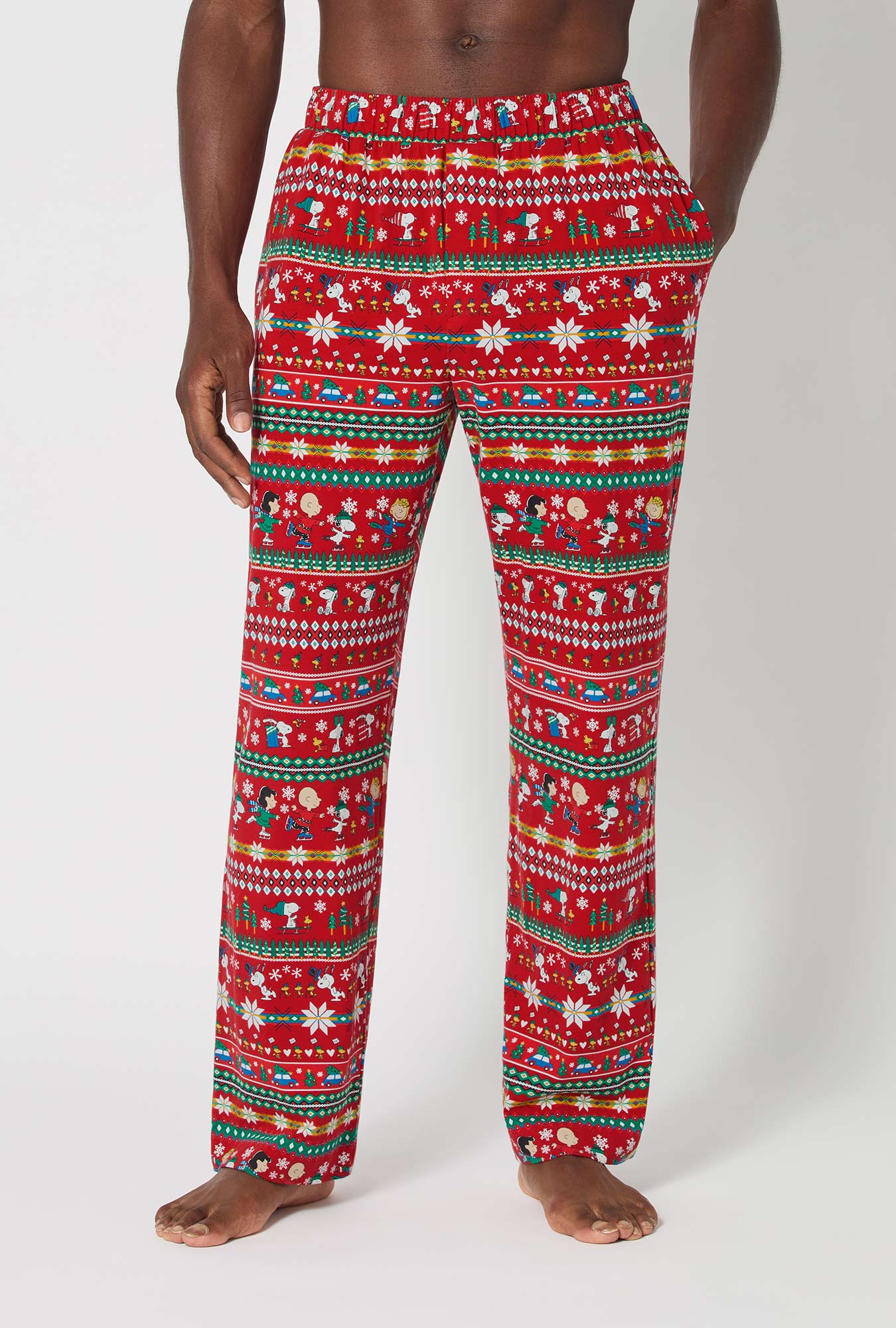 A man wearing Peanuts®  Winter Fairisle Men's Stretch Jersey Pj Pant