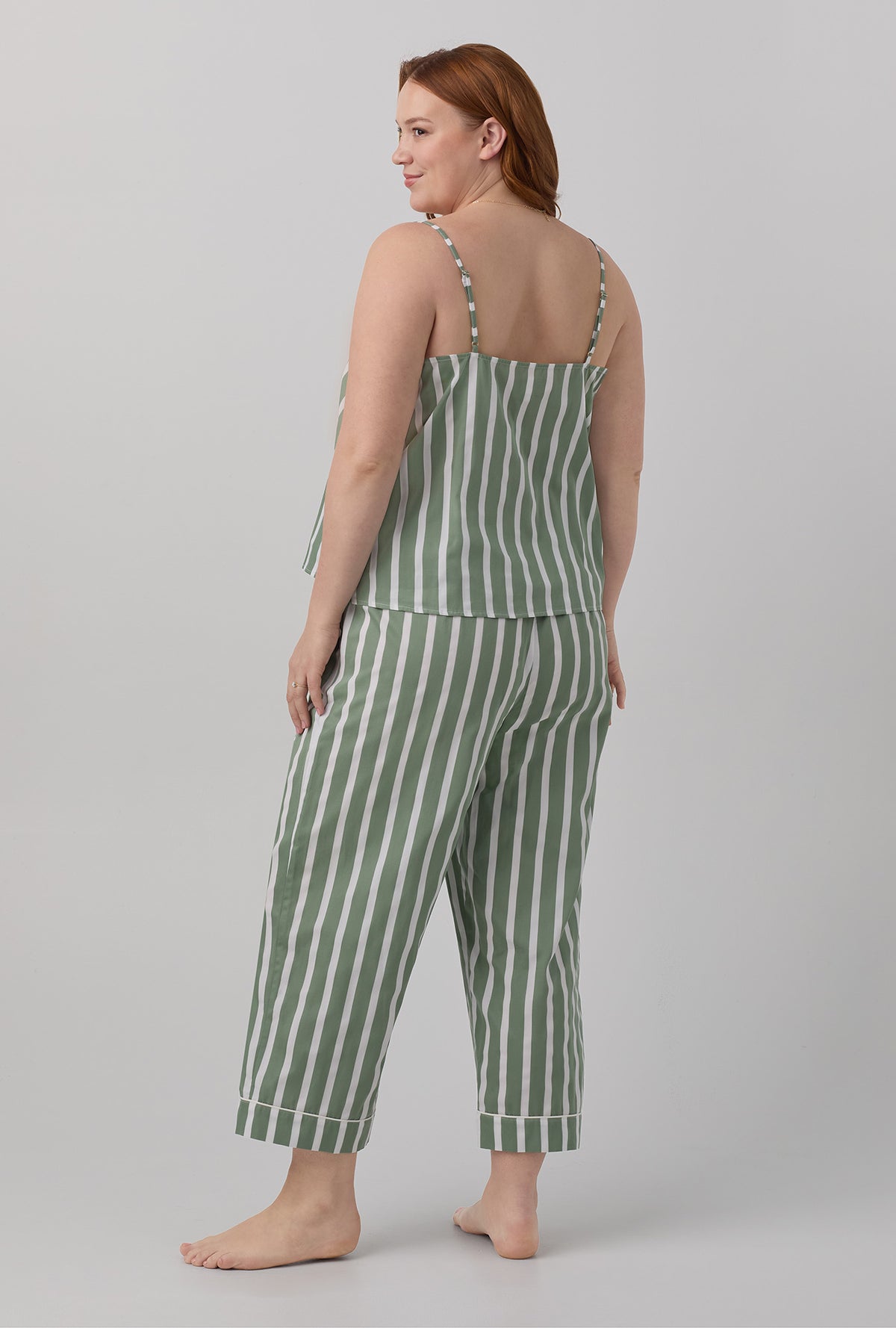 A lady wearing plus size green Woven Cotton Sateen Cropped PJ Set with North Shore Stripe print.