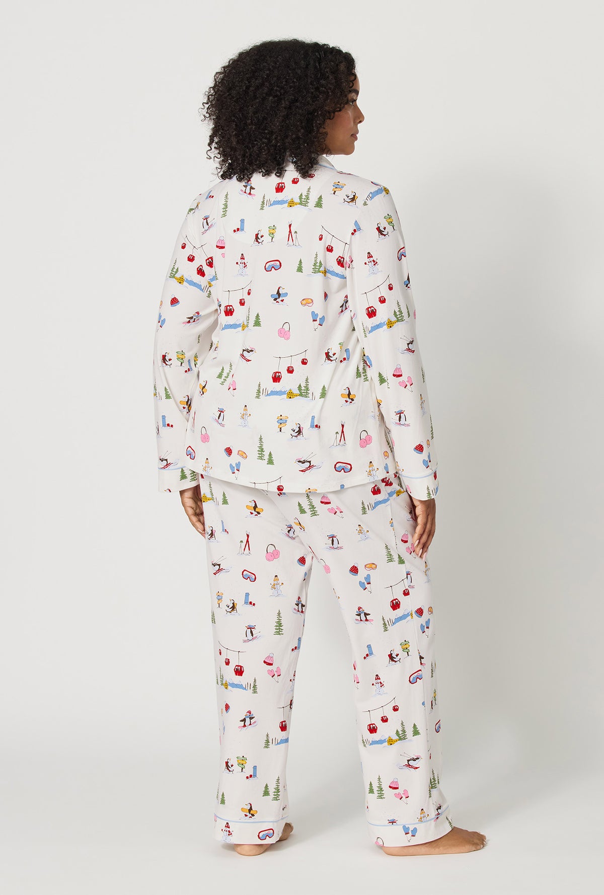 A lady wearing plus size Snow Much Fun Long Sleeve Classic Stretch Jersey Pj Set back view