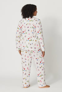 A lady wearing plus size Snow Much Fun Long Sleeve Classic Stretch Jersey Pj Set back view