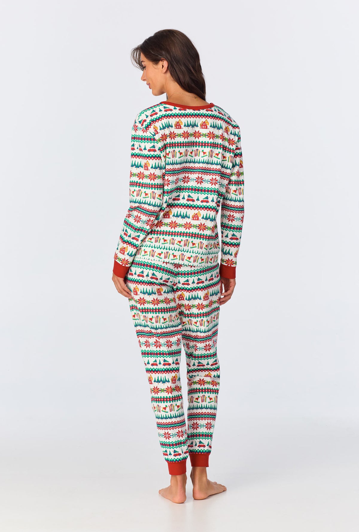 A lady wearing Festive Fairisle Long Sleeve Pullover Crew and Jogger Stretch Jersey PJ Set