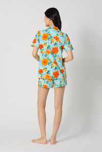 A lady wearing Golden Breeze Short Sleeve Classic Shorty Stretch Jersey Pj Set back view