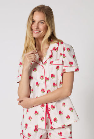 A Lady Wearing Celeste Short Sleeve Classic Woven Supersoft Cotton Poplin Shorty Pj Set in a close up view pose