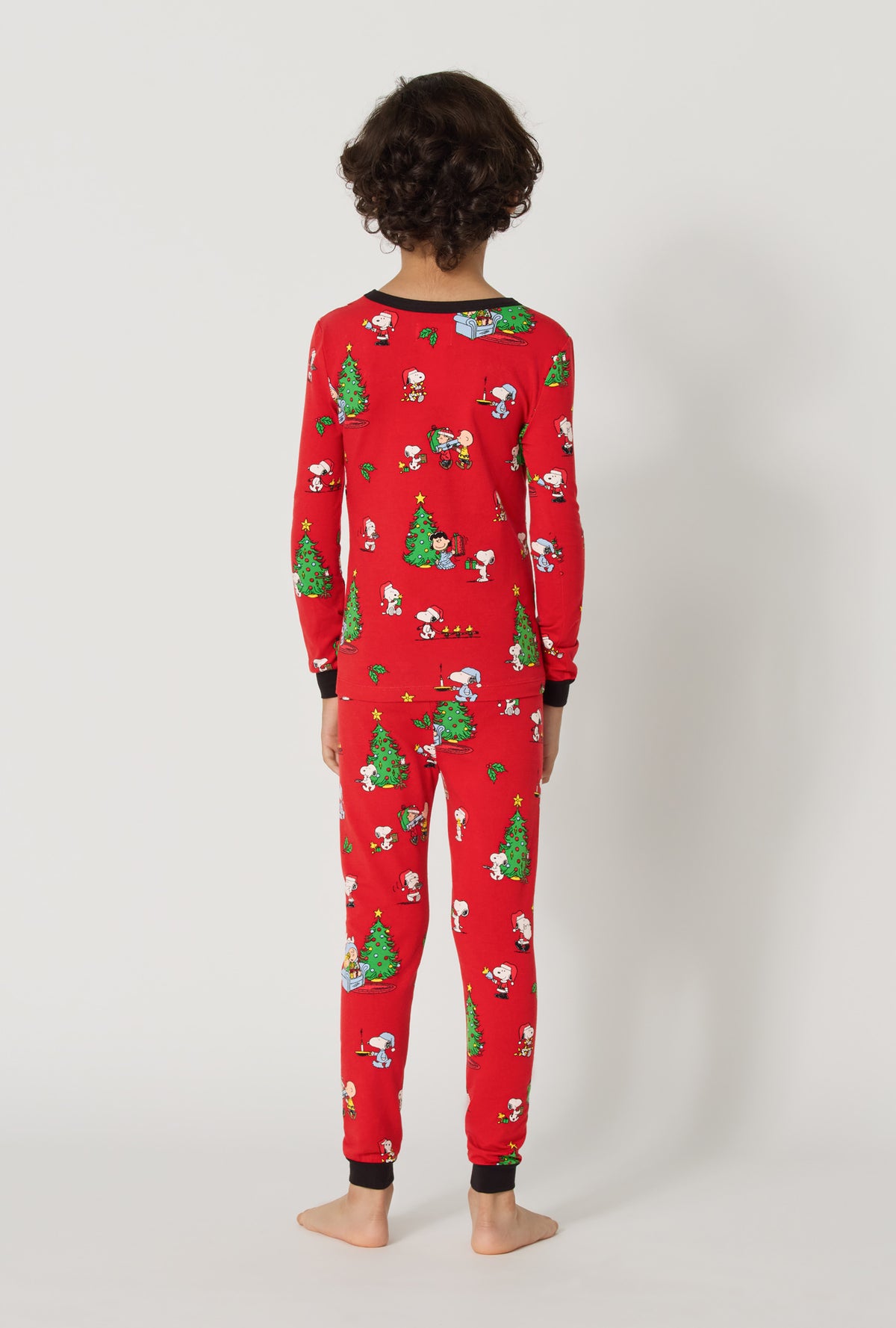 A boy wearing Merry, Beagle, & Bright Long Sleeve Stretch Jersey Kids Pj Set back view