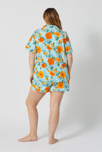 A lady wearing plus size Golden Breeze Short Sleeve Classic Shorty Stretch Jersey Pj Set back view