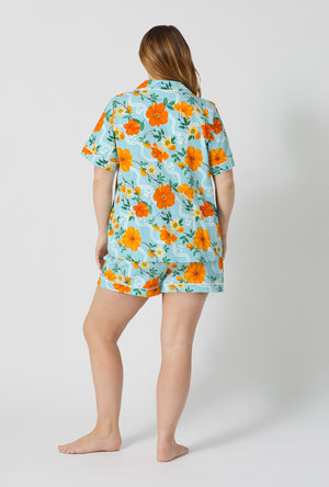 A lady wearing plus size Golden Breeze Short Sleeve Classic Shorty Stretch Jersey Pj Set back view