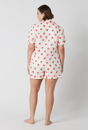A Lady Wearing Plus Size Celeste Short Sleeve Classic Woven Supersoft Cotton Poplin Shorty Pj Set in a back view pose