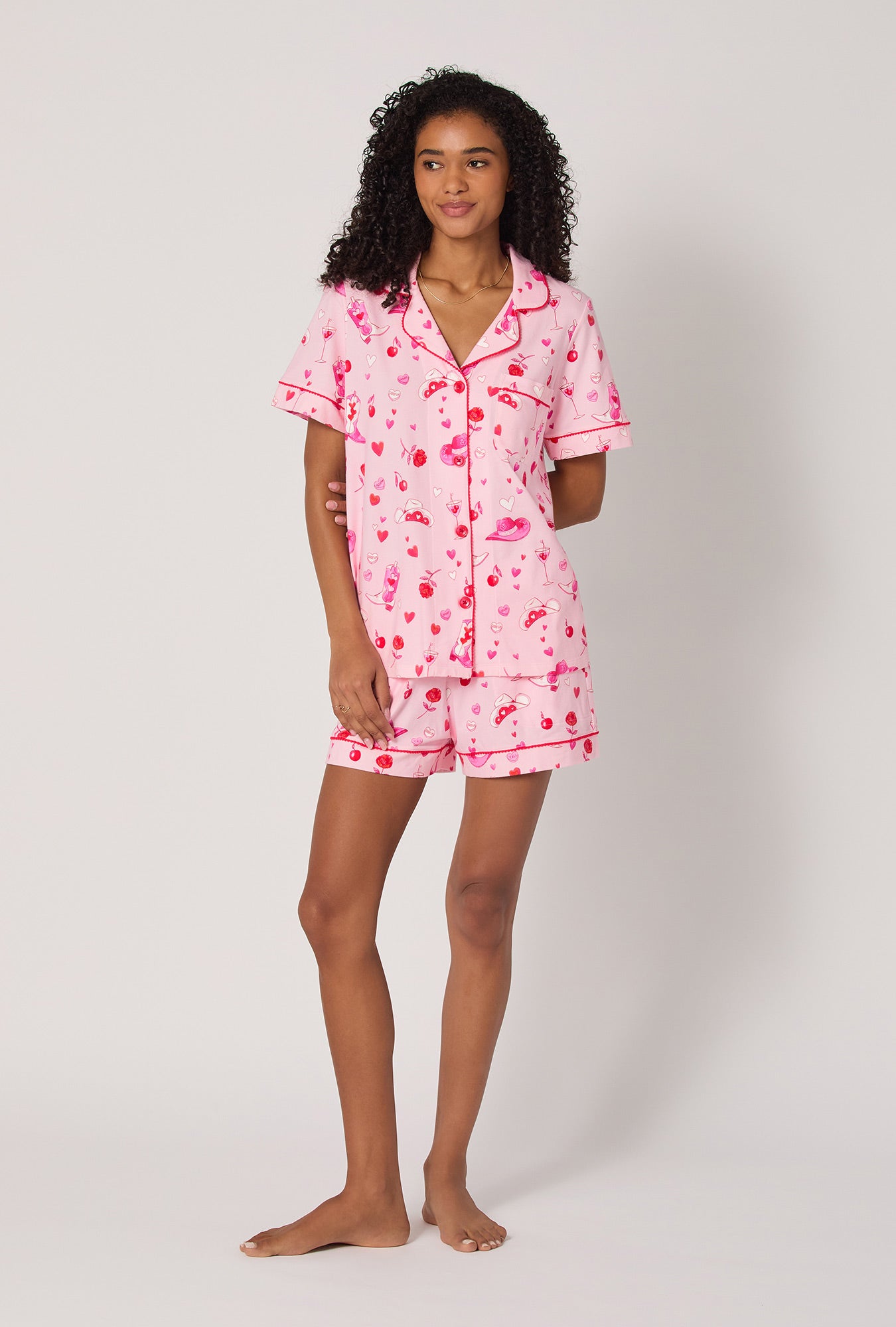 A lady wearing Giddy Up Galentine Short Sleeve Classic Shorty Stretch Jersey Pj Set
