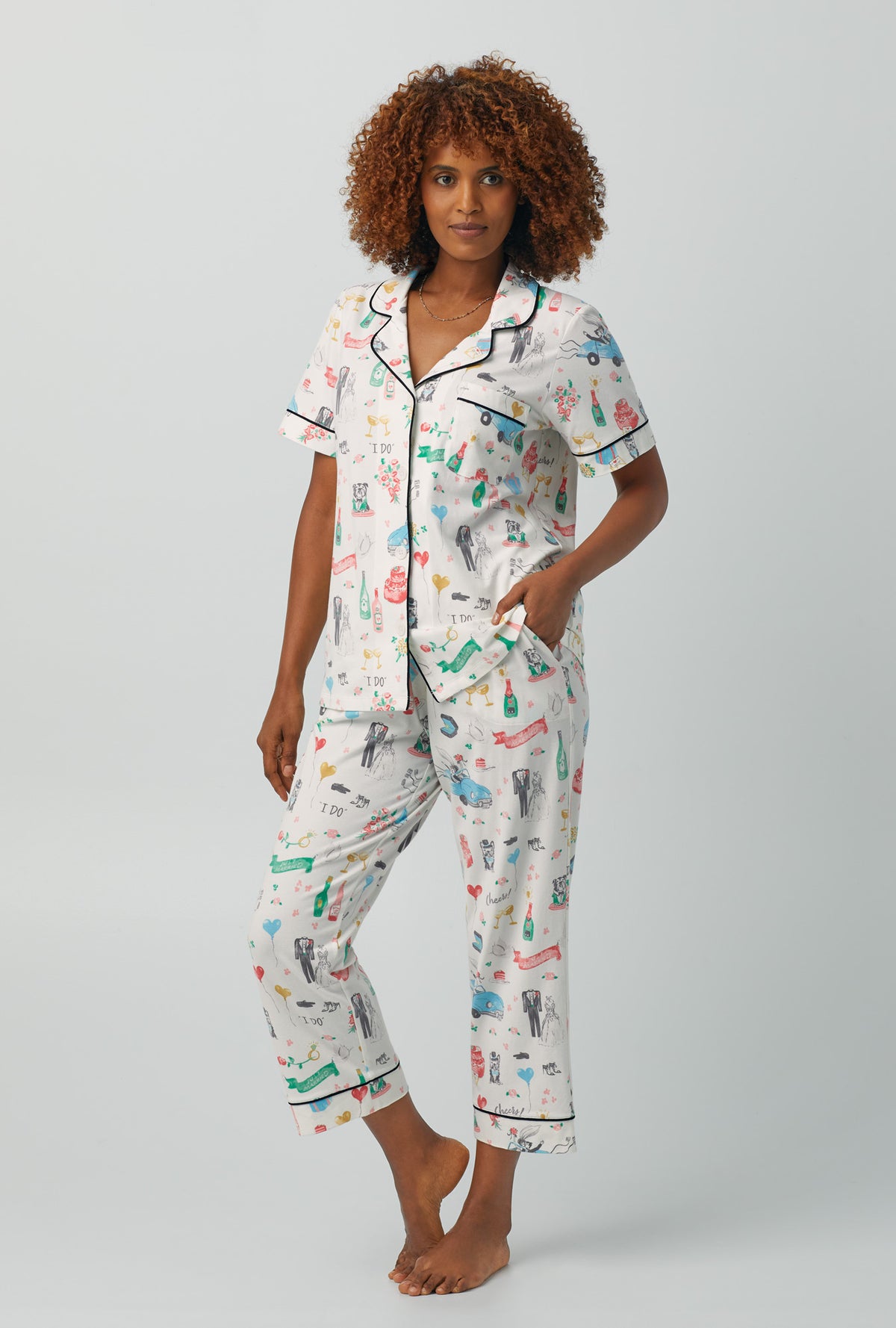 A lady wearing Short Sleeve Classic Stretch Jersey Cropped PJ Set with just married print