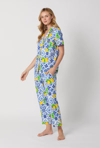A lady wearing Blue and  White Short Sleeve Classic Stretch Jersey Cropped Pj Set side view