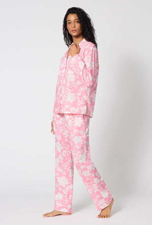 A Lady Wearing Dynasty Pink Long Sleeve Classic Woven Cotton Poplin Pj Set in a side angled pose