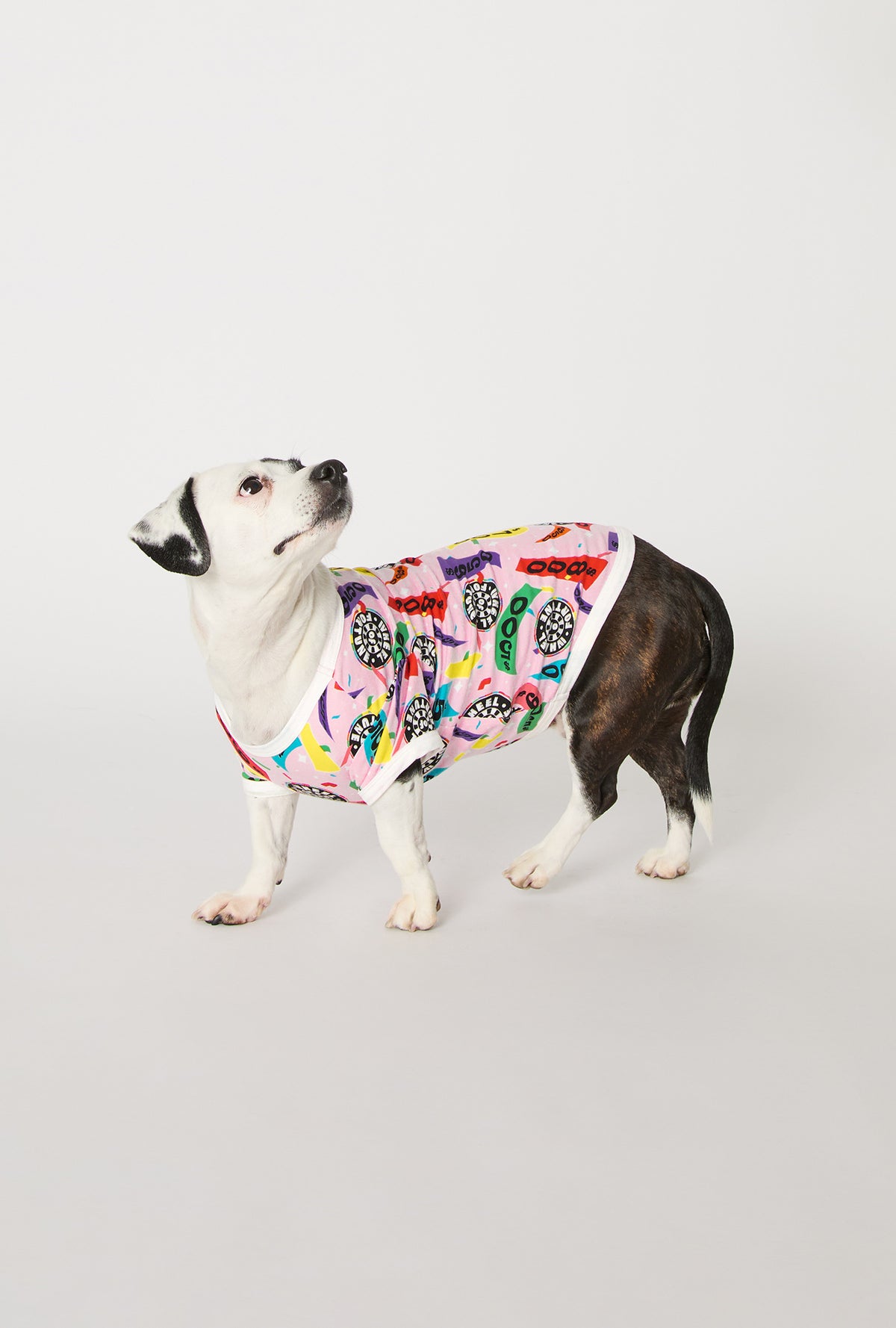 A dog wearing Spin To Win Stretch Jersey Dog Pajama
