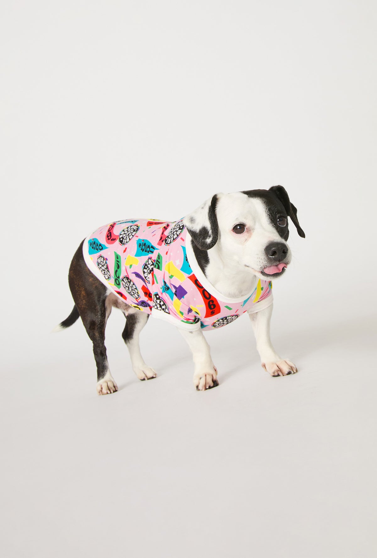 A dog wearing Spin To Win Stretch Jersey Dog Pajama