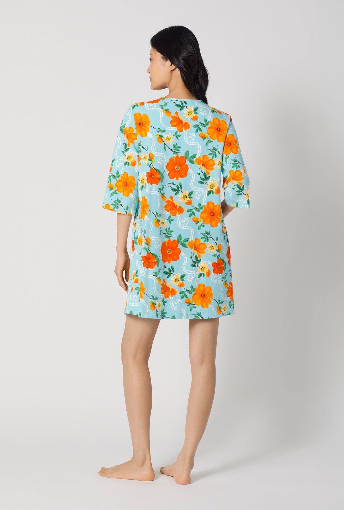 A lady wearing Golden Breeze Stretch Jersey Sleep Dress back view