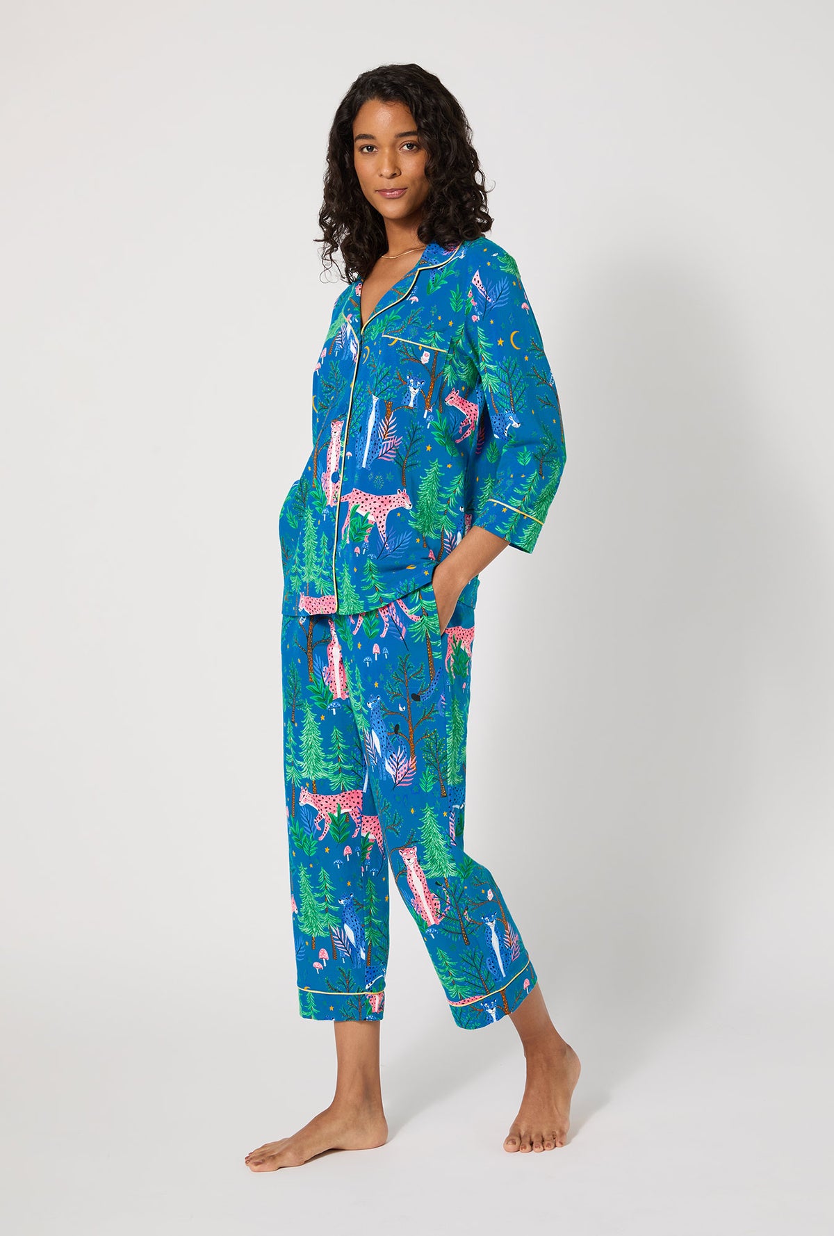 A lady wearing Midnight Forest 3/4 Sleeve Classic Stretch Jersey Cropped Pj Set