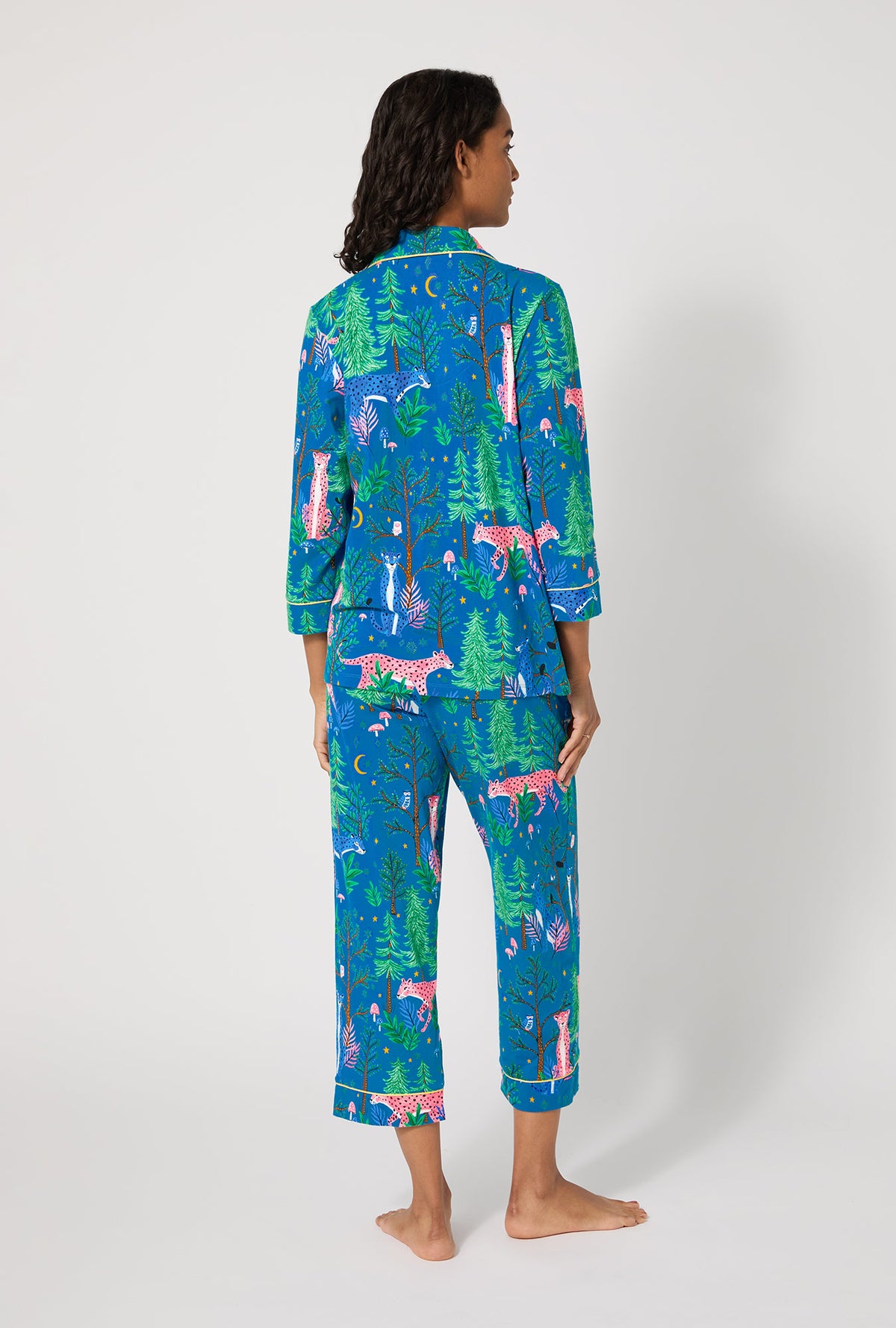 A lady wearing Midnight Forest 3/4 Sleeve Classic Stretch Jersey Cropped Pj Set