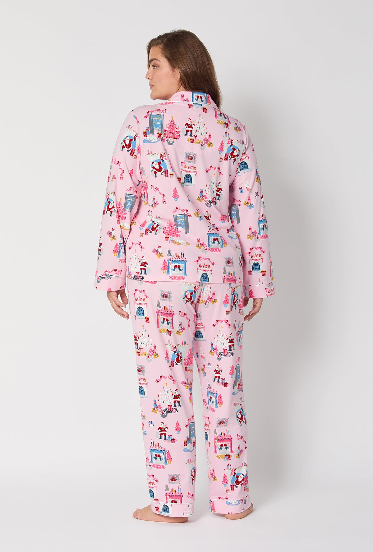 A lady wearing Must Be Santa Long Sleeve Classic Stretch Jersey Pj Set