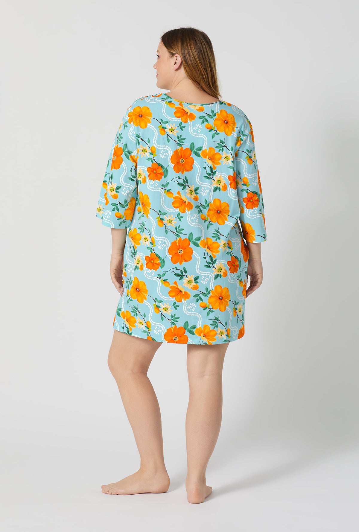 A lady wearing plus size Golden Breeze Stretch Jersey Sleep Dress back view