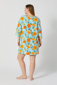 A lady wearing plus size Golden Breeze Stretch Jersey Sleep Dress back view