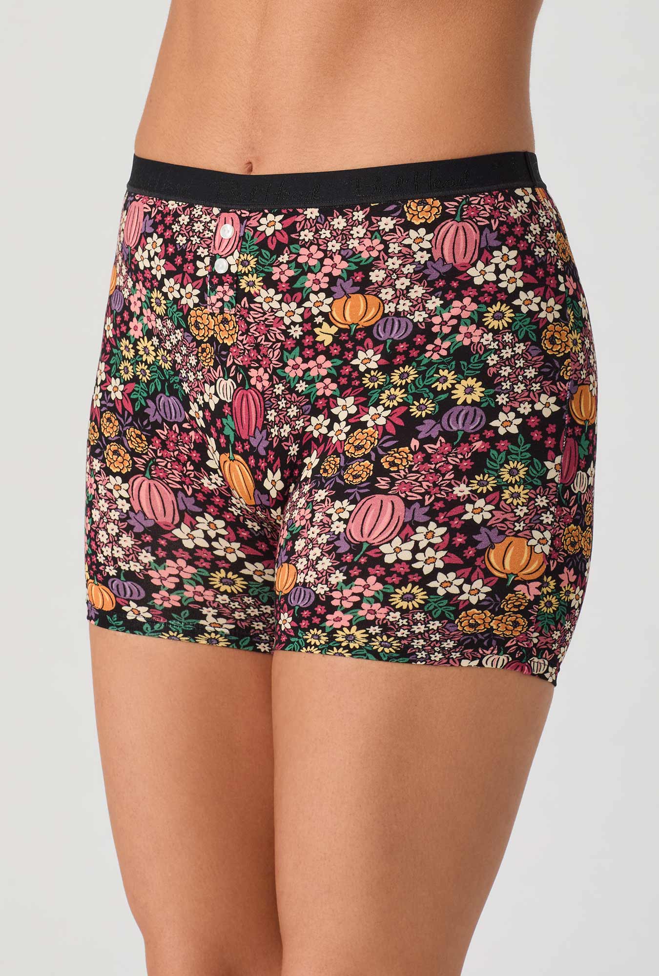 A lady wearing Pumpkin Ditsy Stretch Jersey Boxer Short