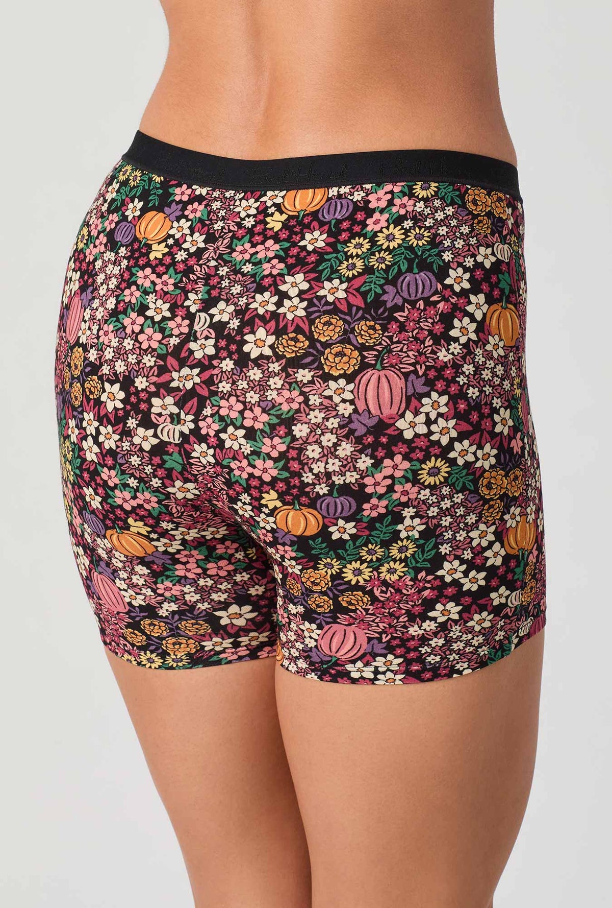 A lady wearing Pumpkin Ditsy Stretch Jersey Boxer Short