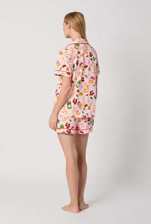 A lady wearing Pink Short Sleeve Classic Shorty Stretch Jersey Pj Set back view