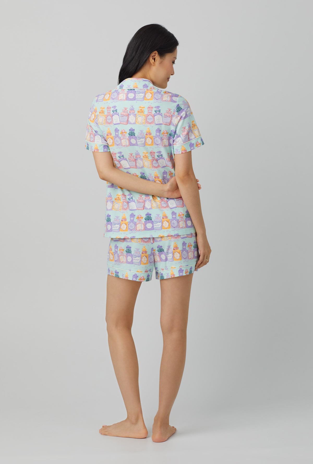 A lady wearing short sleeve classic stretch jersey pj set with perfect scents print