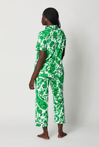 A lady wearing Green and  White Short Sleeve Classic Stretch Jersey Cropped Pj Set back view