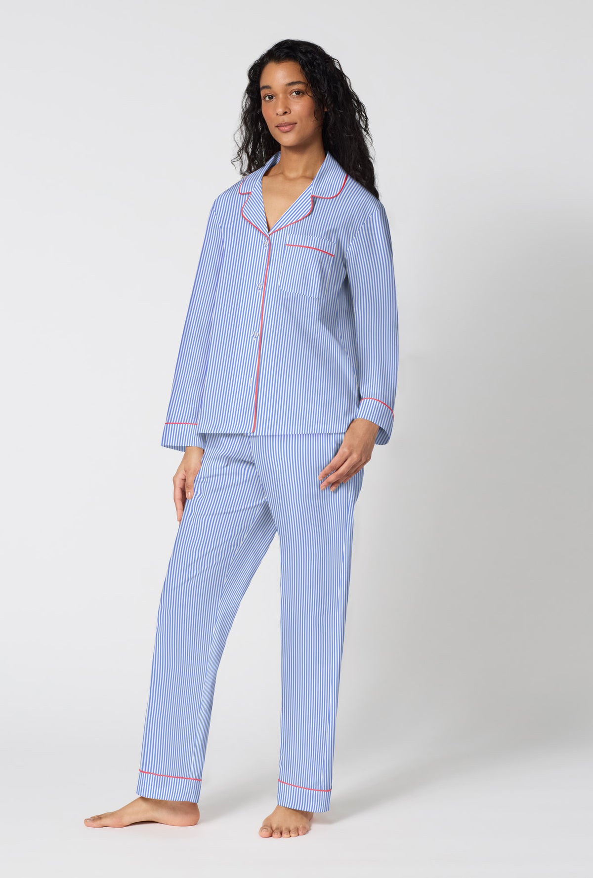 A Lady Wearing French Stripe Long Sleeve Classic Woven Supersoft Cotton Poplin Pj Set in front facing side angled pose
