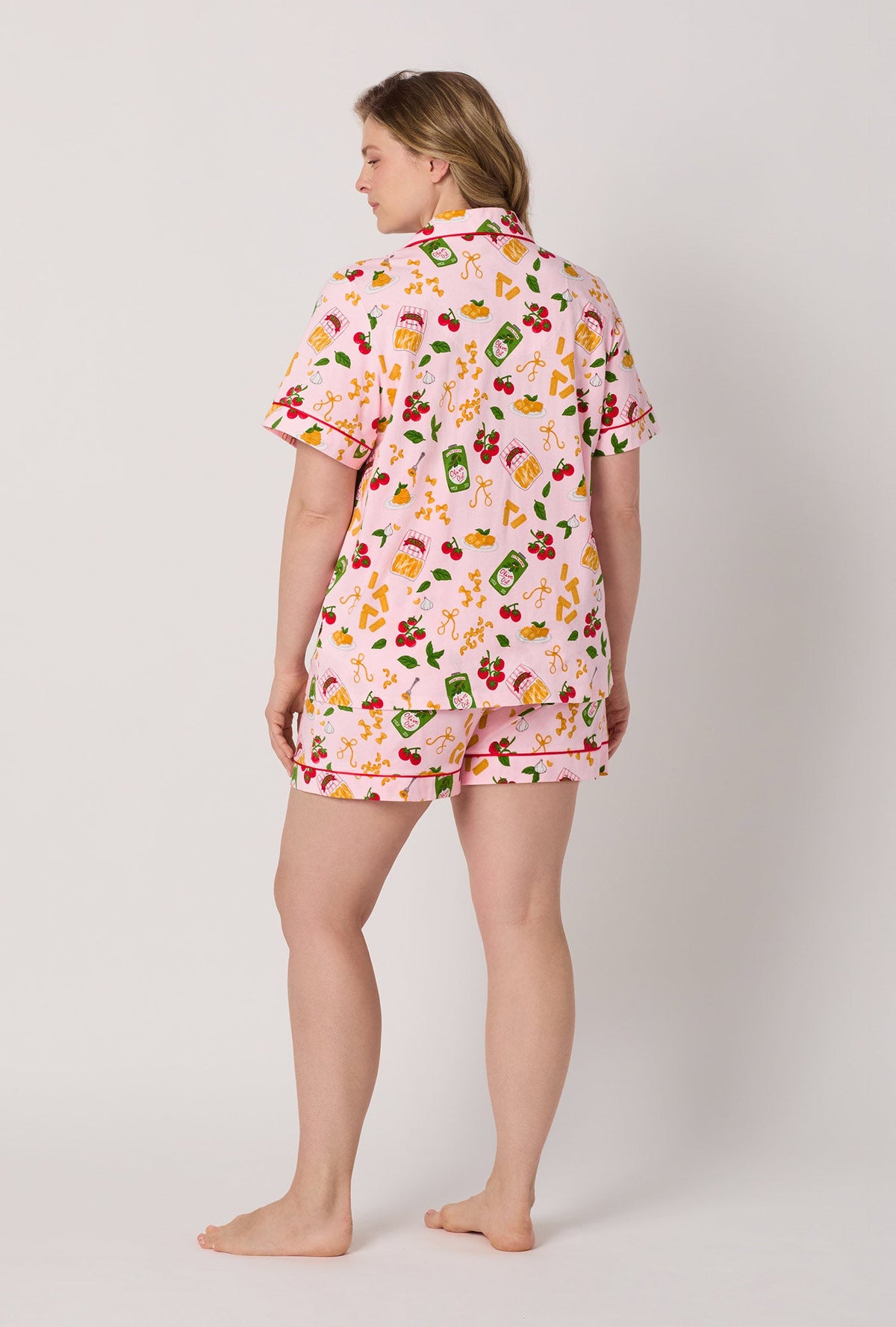 A lady wearing plus size Pink Short Sleeve Classic Shorty Stretch Jersey Pj Set back view