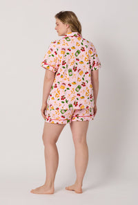 A lady wearing plus size Pink Short Sleeve Classic Shorty Stretch Jersey Pj Set back view