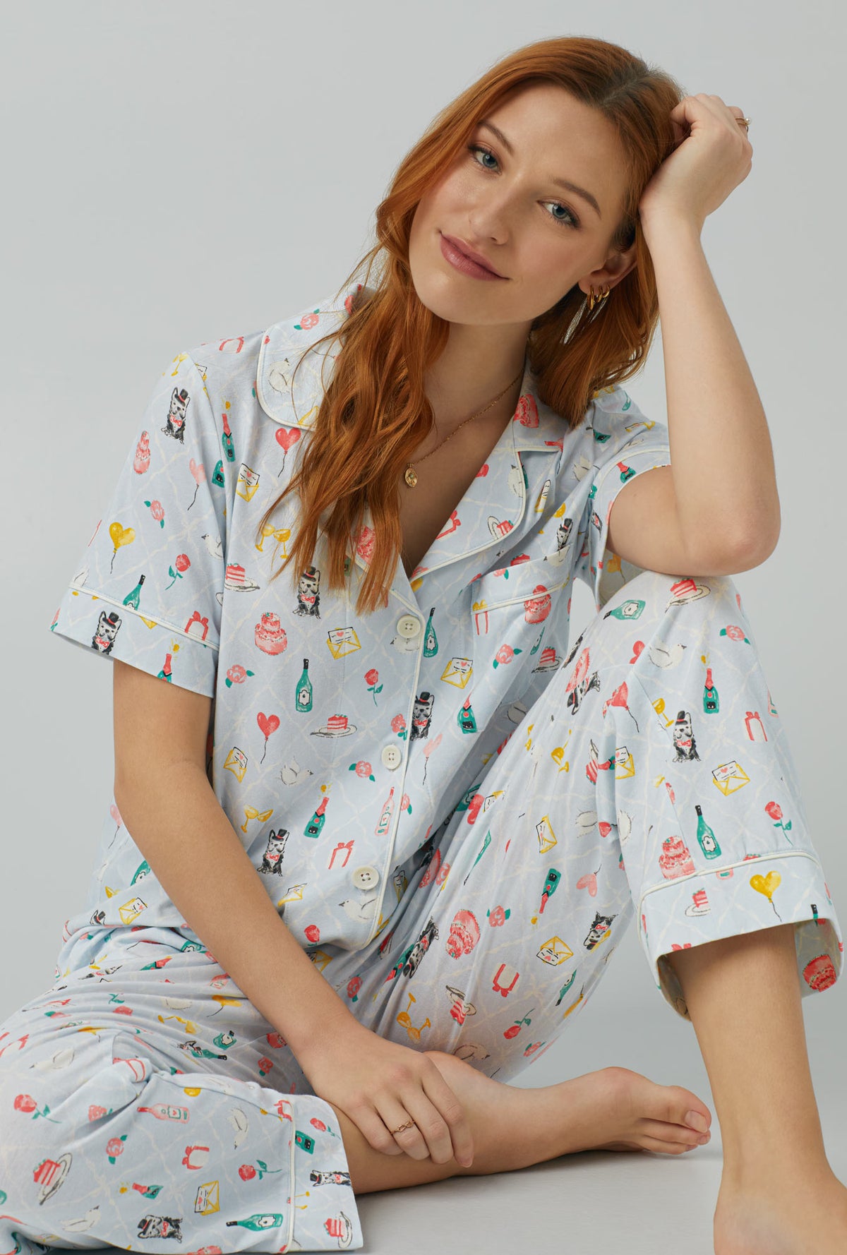 A lady wearing Short Sleeve Classic Stretch Jersey Cropped PJ Set with wedding party print