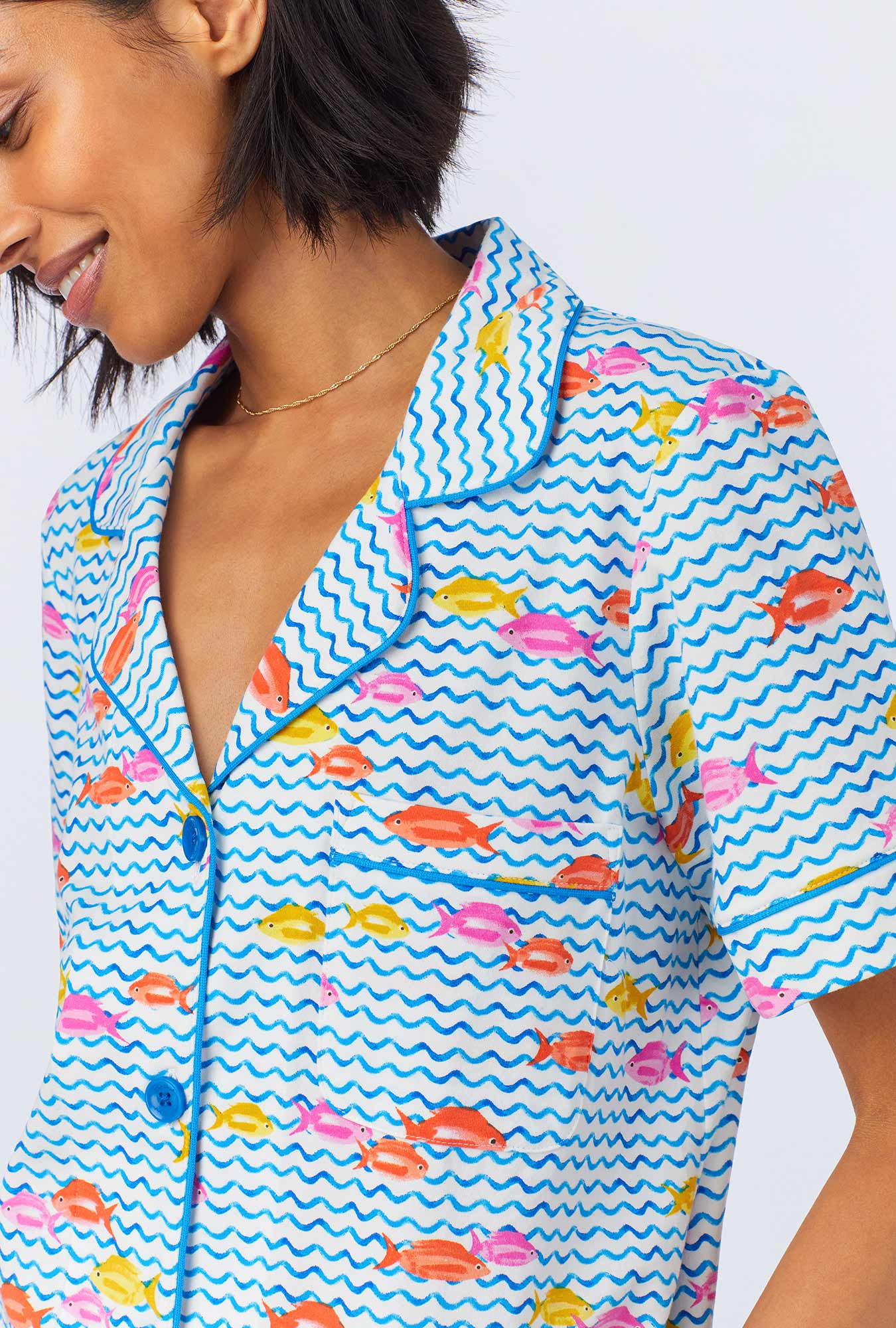 A lady wearing Marina Grande Short Sleeve Classic Stretch Jersey Cropped PJ Set