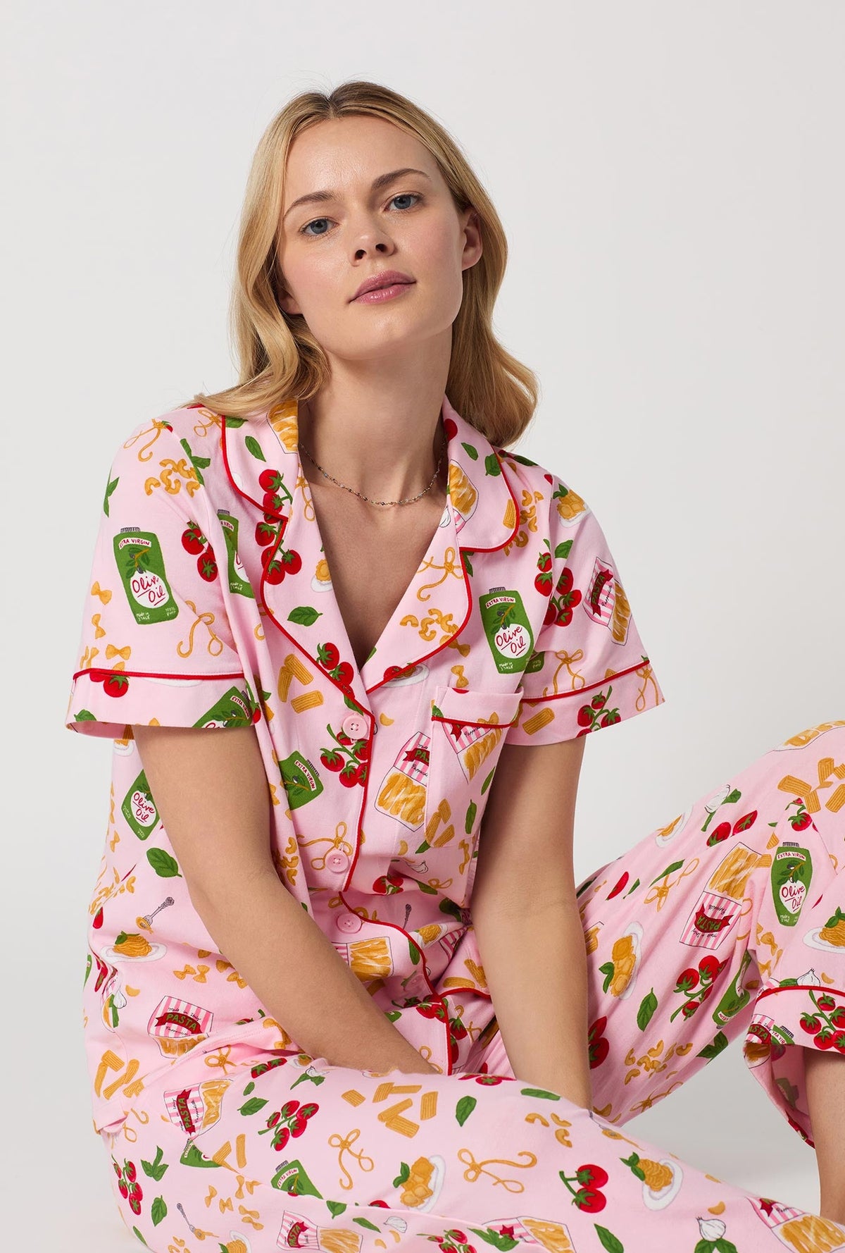 A closeup of A lady wearing Pink Short Sleeve Classic Stretch Jersey Cropped Pj Set