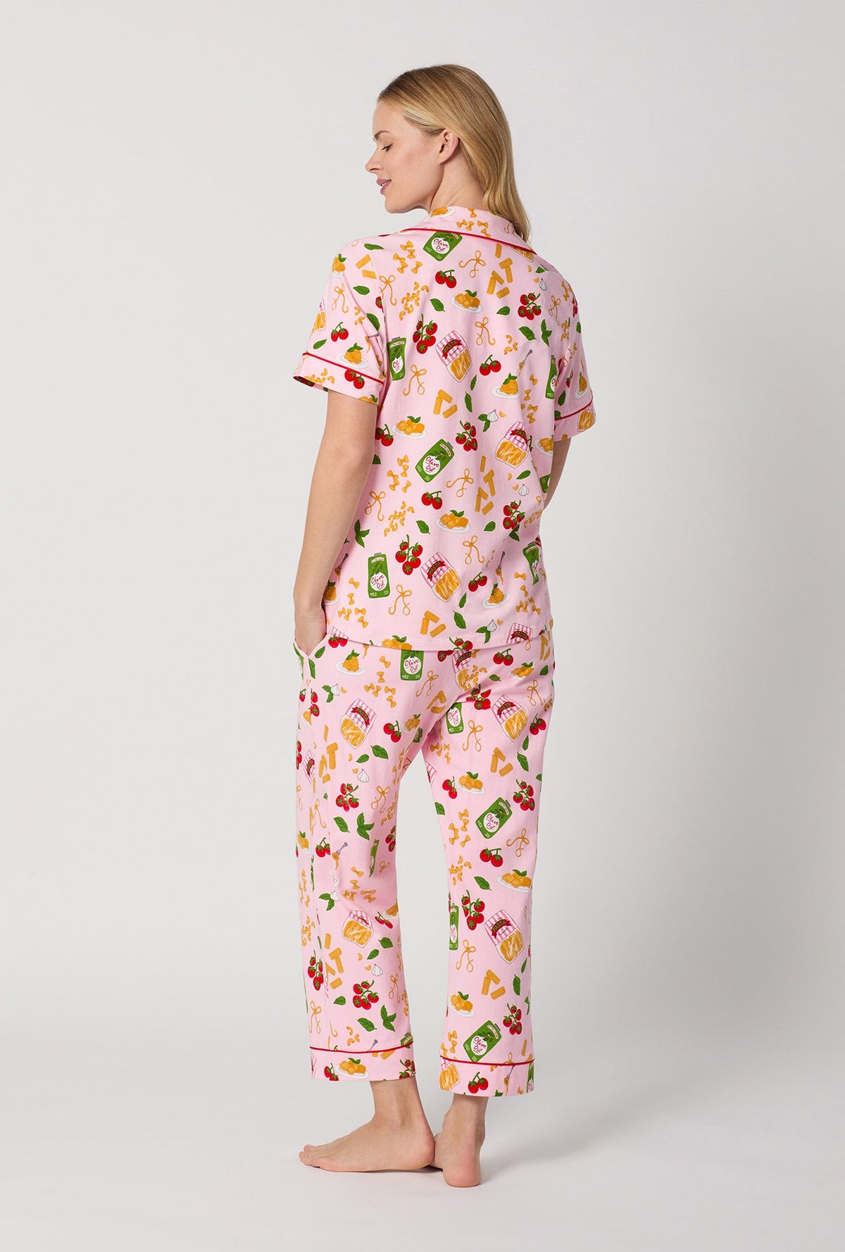 A lady wearing Pink Short Sleeve Classic Stretch Jersey Cropped Pj Set back view