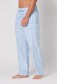 A man wearing Meadow Haze Plaid Men's Woven Portuguese Flannel Pj Pant side view