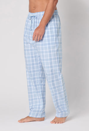 A man wearing Meadow Haze Plaid Men's Woven Portuguese Flannel Pj Pant side view